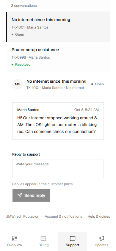 Customer support conversation on a phone, showing the ticket reference, status, messages, and reply controls